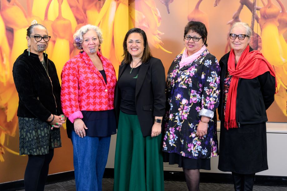 Group photo of five people standing side by side indoors. From left to right: Hineroa Hakiaha, Brenda Close (Chair), Raukahawai O’Connor (Deputy Chair), Hemaima Reihana-Tait and Sandra McDonald..
